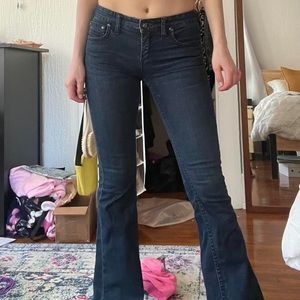 Vintage free people dark flare jeans.